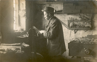 Alfred working at the lathe